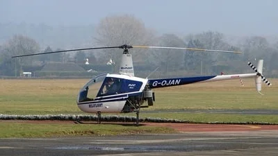 Heliflight UK G-OJAN Robinson R22 Beta